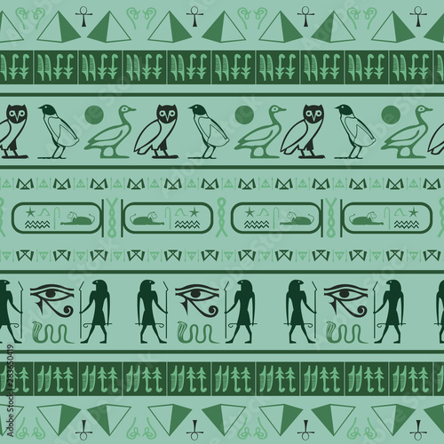 Hieroglyphic egyptian language symbols seamless background.