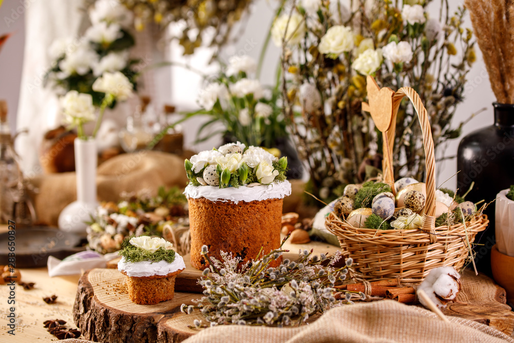 Traditional Russian Easter cakes Kulich, with eggs on a vintage wooden background. Traditional Russian Easter cakes Kulich, with eggs on a vintage wooden background.