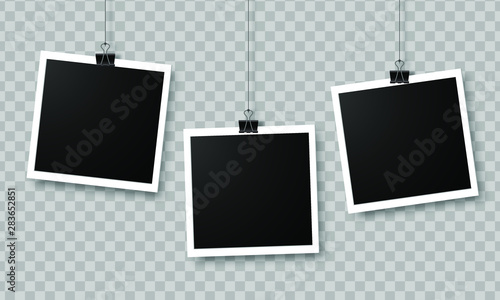 Set of empty photo frames hanging on a clip isolated on transparent background.  Photography art. Template or mockup for design.