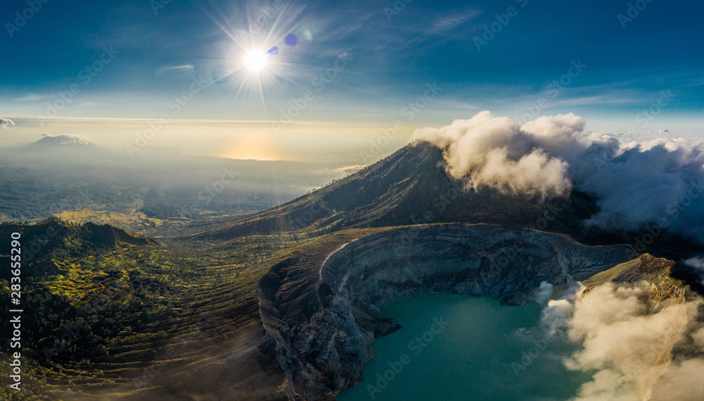 Aerial view of beautiful Ijen volcano with acid lake and sulfur gas going from crater, Indonesia - obrazy, fototapety, plakaty 