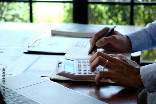 Businessmen, financial accountants, planners, work, planning, ideas in the office, using the tools and calculators to work