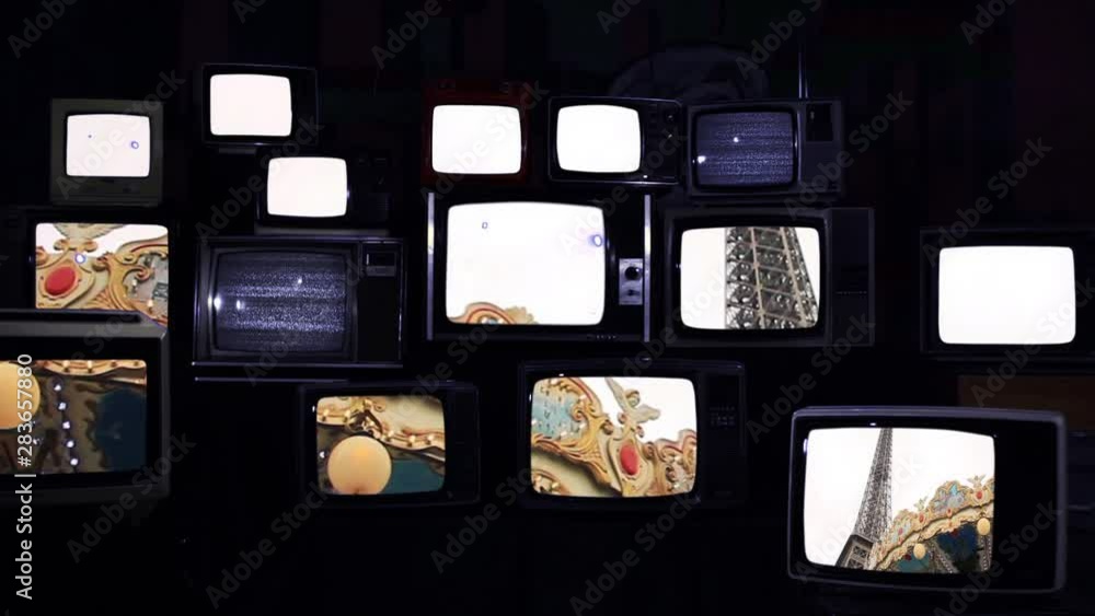 Eiffel Tower And Carousel In Paris, Seen On Many Retro TVs. Eiffel Tower And Carousel In Paris, Seen On Many Retro TVs.