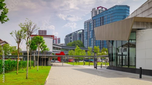 sunny day kuala lumpur city living block metro station park panorama 4k timelapse malaysia photo