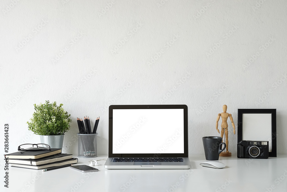Workspace desk and laptop. copy space and blank screen. Business image, Blank screen laptop and supplies. Workspace desk and laptop. copy space and blank screen. Business image, Blank screen laptop and supplies.