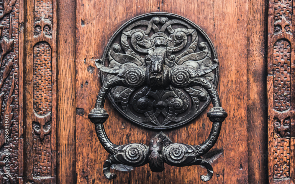 Forged Antique Doorknob. Antique door knocker. Forged Antique Doorknob. Antique door knocker.