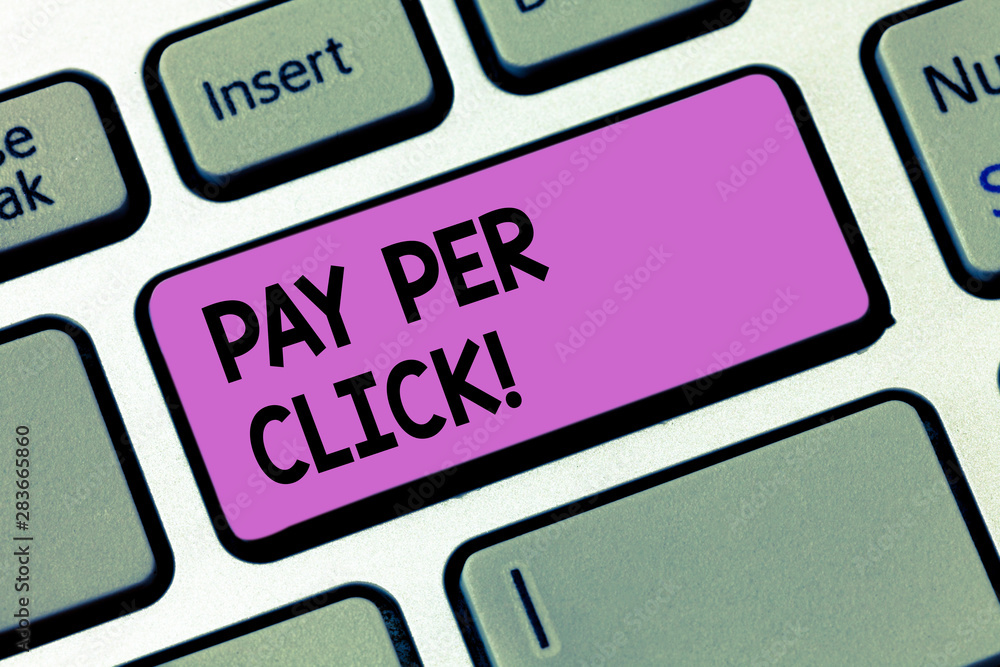 Writing note showingPay Per Click. Business photo showcasing Internet Advertising Model Search Engine marketing Strategy Keyboard key Intention to create computer message pressing keypad idea Writing note showingPay Per Click. Business photo showcasing Internet Advertising Model Search Engine marketing Strategy Keyboard key Intention to create computer message pressing keypad idea