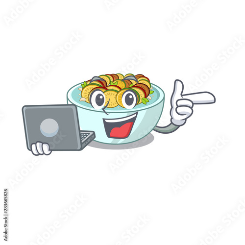 With laptop ratatouille is cooked in mascot pan