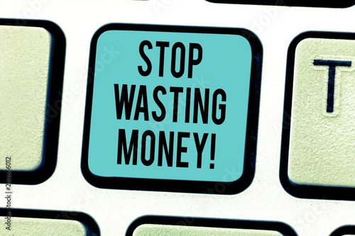 Writing note showing Stop Wasting Money. Business photo showcasing avoid dissipation waste useless or profitless activity Keyboard key Intention to create computer message pressing keypad idea photo