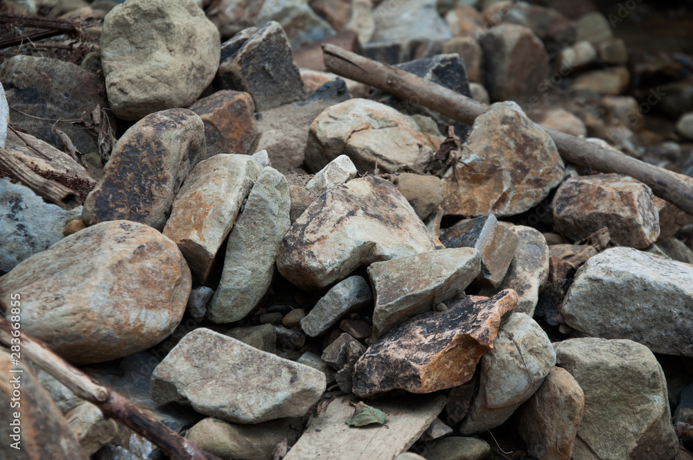 Big and small stones. The mountains. The texture of the stone. Background Big and small stones. The mountains. The texture of the stone. Background