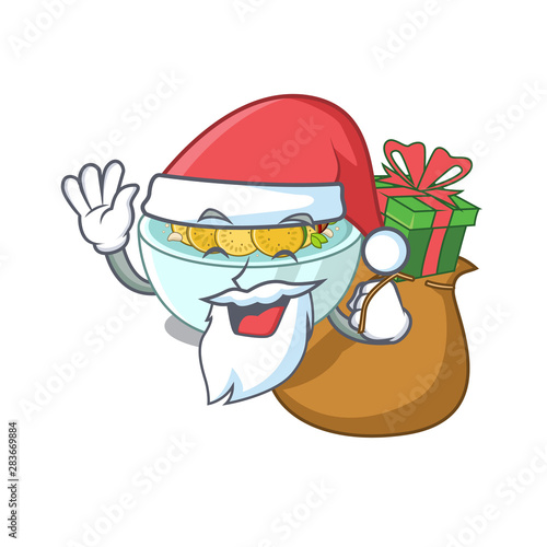 Santa with gift ratatouille on a cartoon wooden table