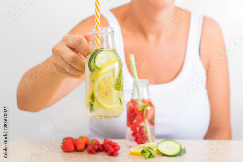 Detox fruit infused water. Refreshing summer homemade cocktail
