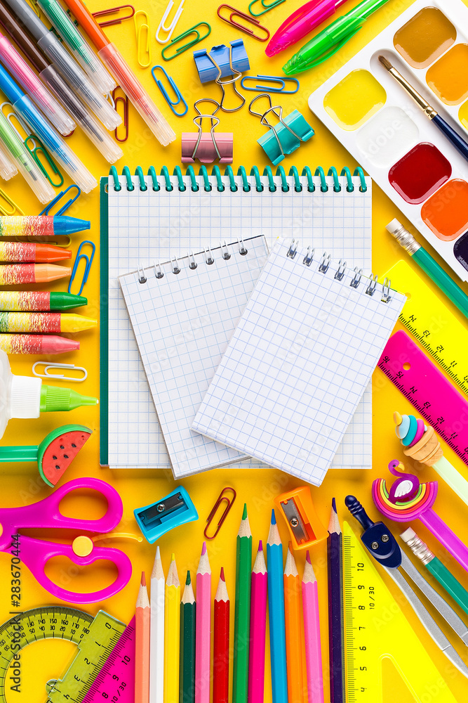 School notebook and various stationery. Back to school concept. School notebook and various stationery. Back to school concept.