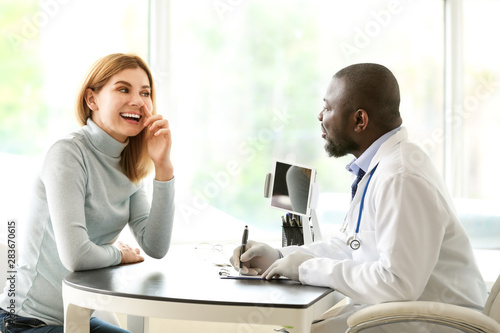 Woman meeting with plastic ...