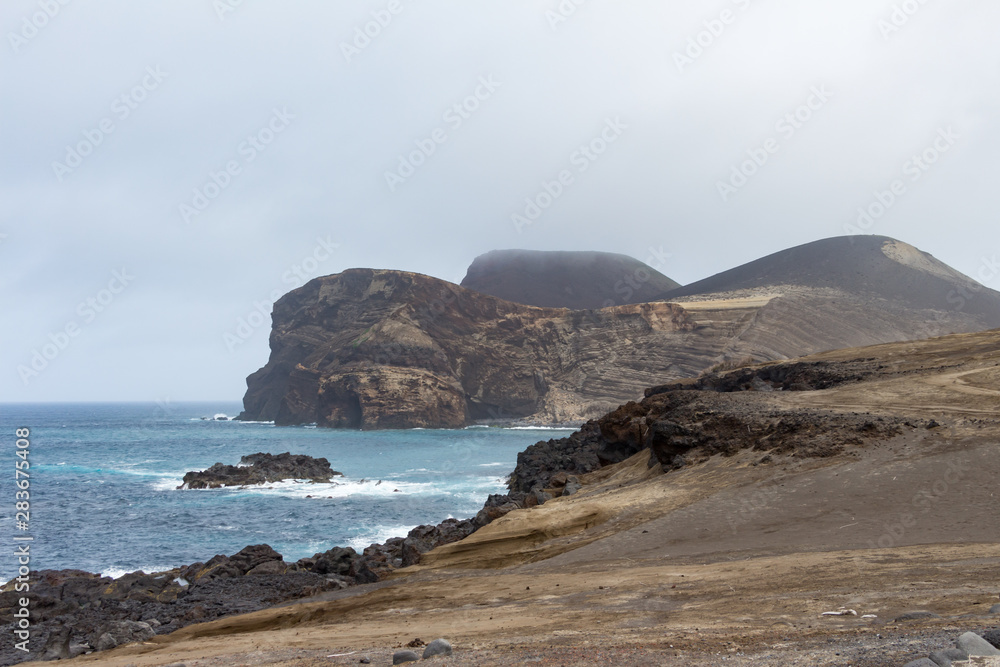 Capelinhos volcano on western coast on Faial island, Azores, Portugal. Last volcano eruption was in 1957.