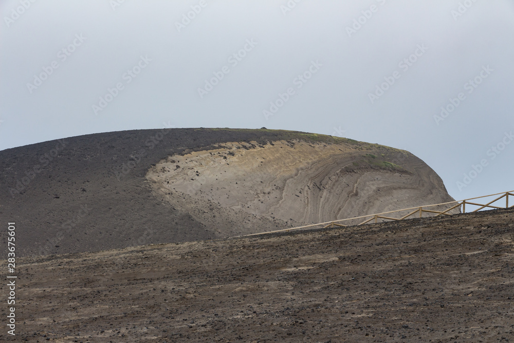 Capelinhos volcano on western coast on Faial island, Azores, Portugal. Last volcano eruption was in 1957.