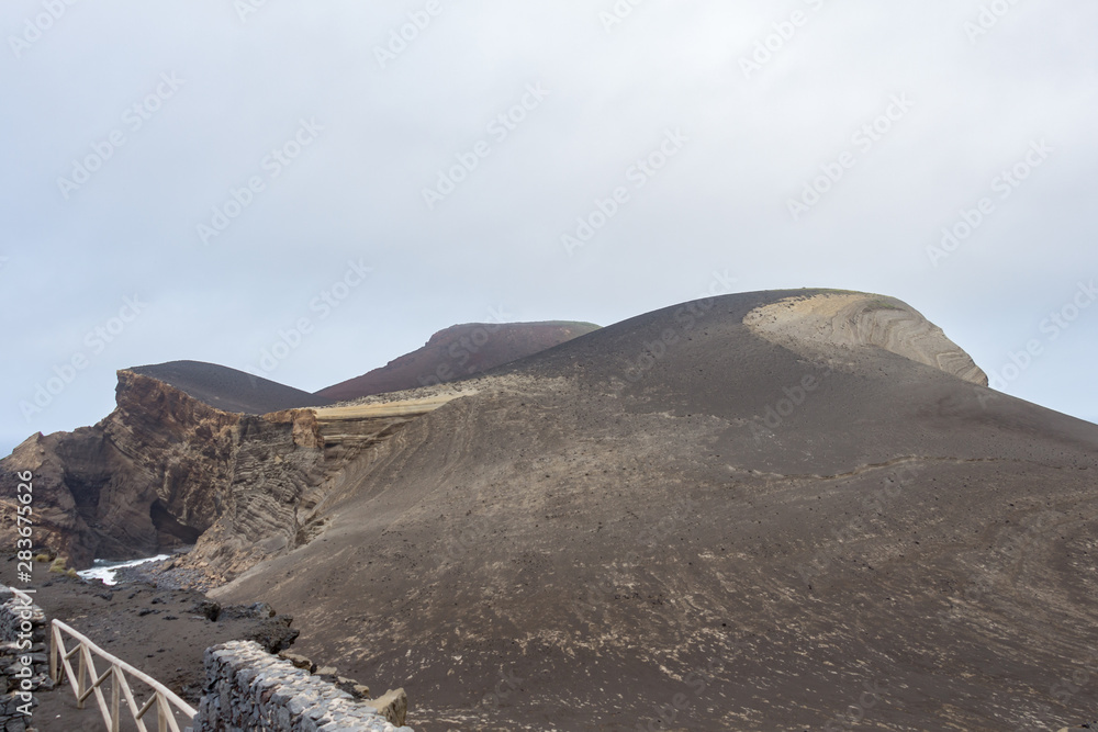 Capelinhos volcano on western coast on Faial island, Azores, Portugal. Last volcano eruption was in 1957.