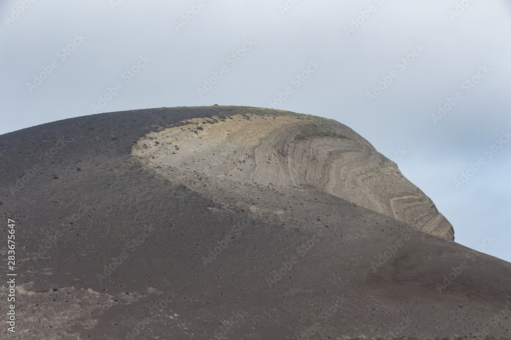 Capelinhos volcano on western coast on Faial island, Azores, Portugal. Last volcano eruption was in 1957.