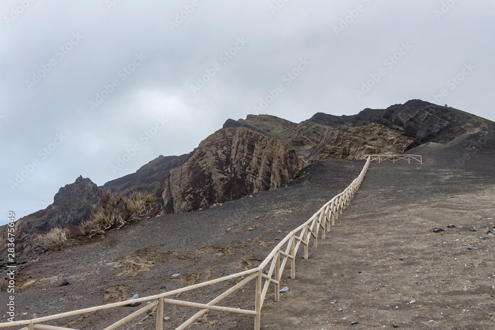Capelinhos volcano on western coast on Faial island, Azores, Portugal. Last volcano eruption was in 1957.