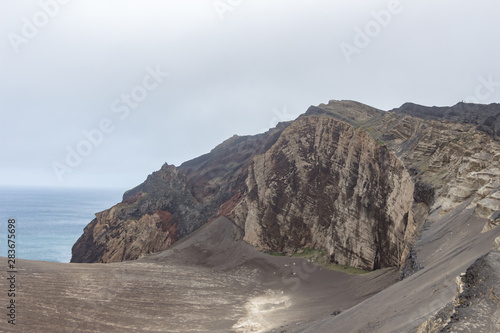 Obraz na płótnie Capelinhos volcano on western coast on Faial island, Azores, Portugal. Last volcano eruption was in 1957. w salonie
