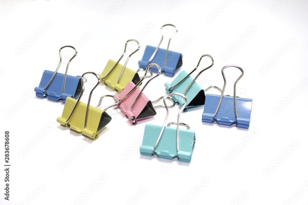 colorful paper clips isolated on white background