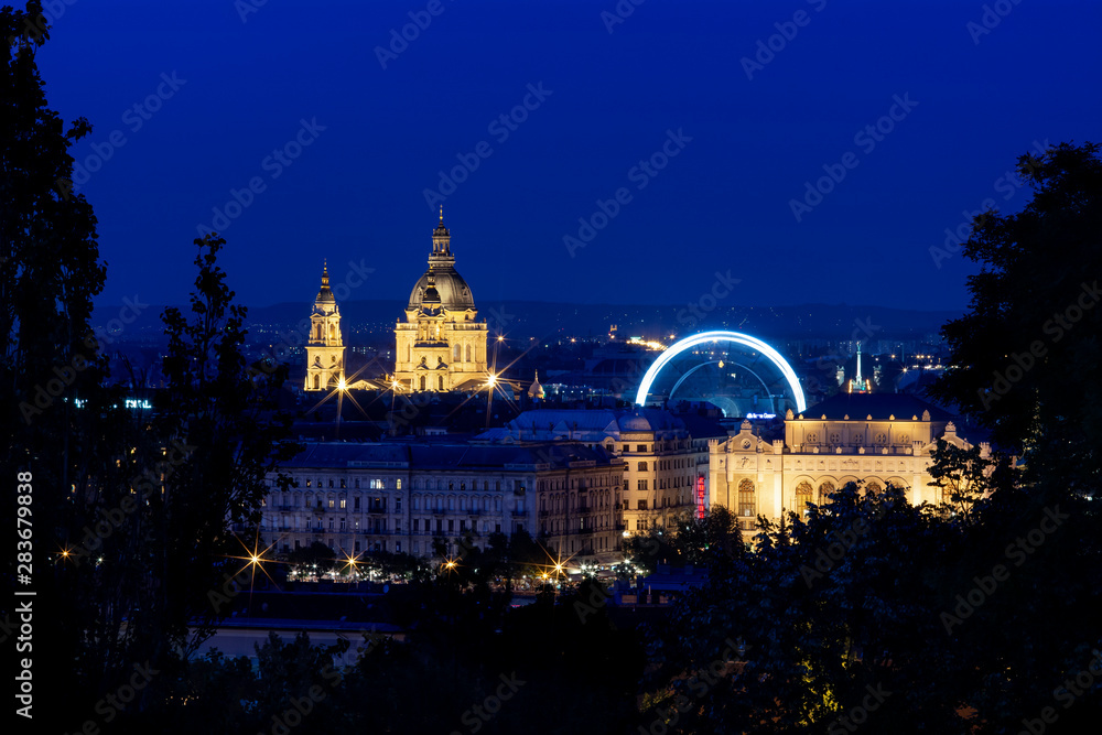 Budapest at night - St. Stephen's Basilica and Budapest Eye