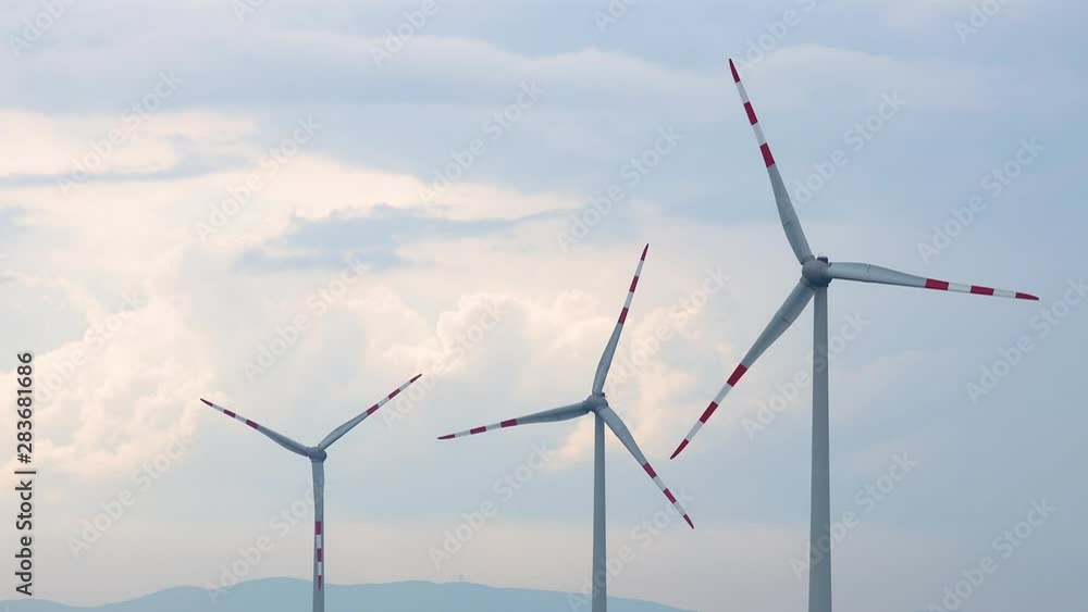Modern windmills working in the wind in Austria Modern windmills working in the wind in Austria