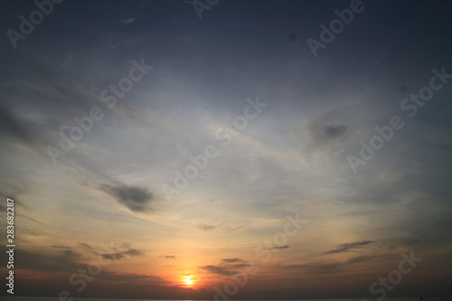 sky with clouds and sun