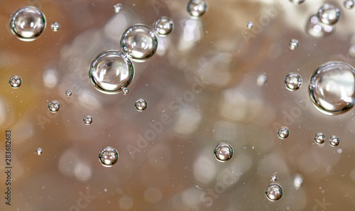 Bubbles of air on the surface of water as an abstract background