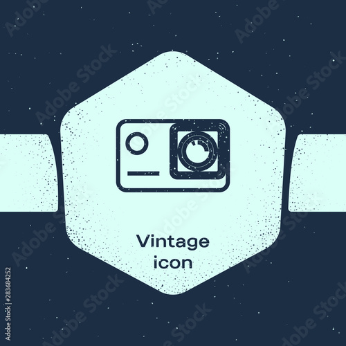 Grunge line Action extreme camera icon isolated on blue background. Video camera equipment for filming extreme sports. Monochrome vintage drawing. Vector Illustration