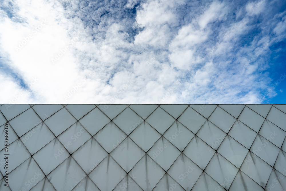 Abstract commercial architecture background, blue sky. High Quality and Resolution Image. Abstract commercial architecture background, blue sky. High Quality and Resolution Image.