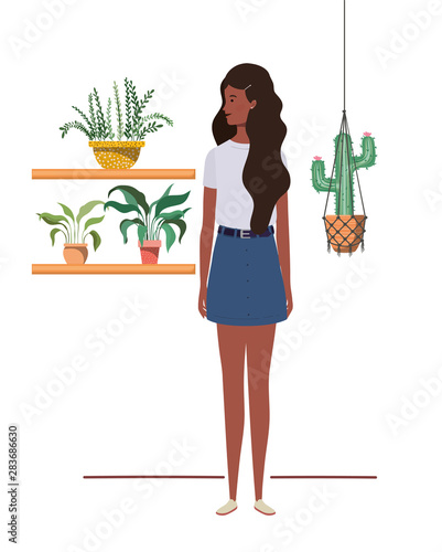 woman with houseplant and macrame hangers
