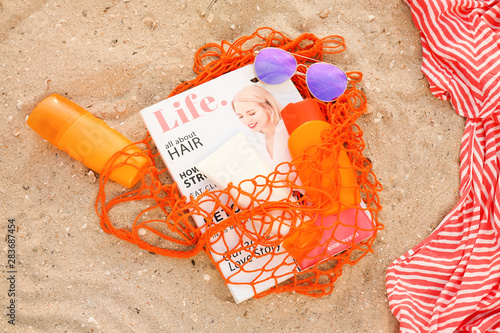 Bag with sunscreen cream, s...
