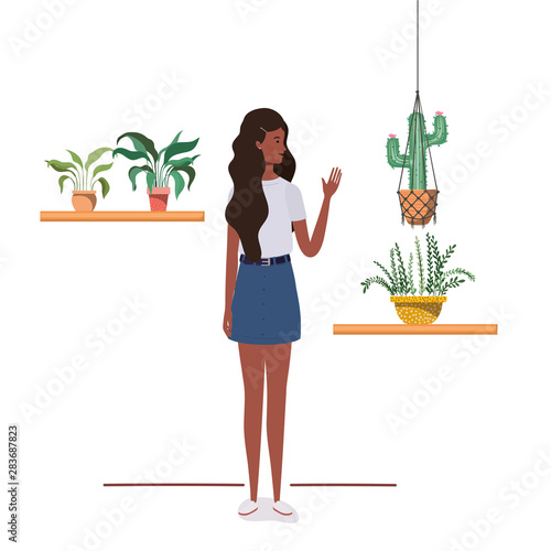 woman with houseplant and macrame hangers
