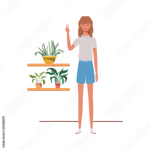 woman with houseplant and macrame hangers