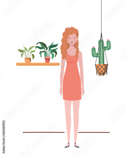 woman with houseplant and macrame hangers