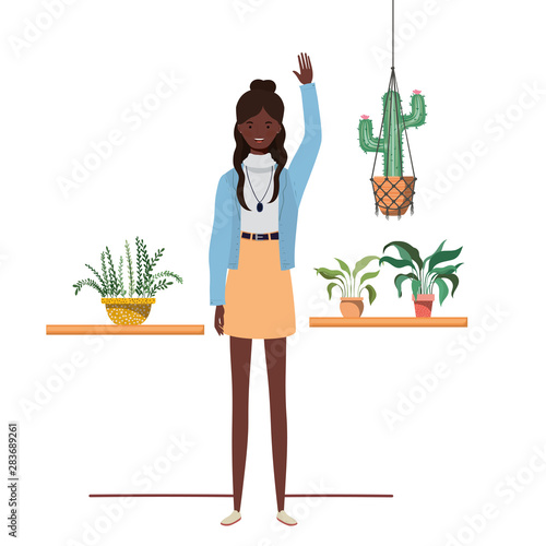 woman with houseplant and macrame hangers