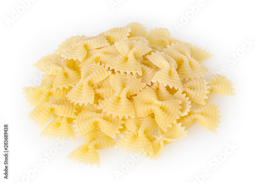 Heap of dried bow tie pasta isolated on white background with clipping path