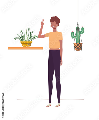 woman with houseplant and macrame hangers