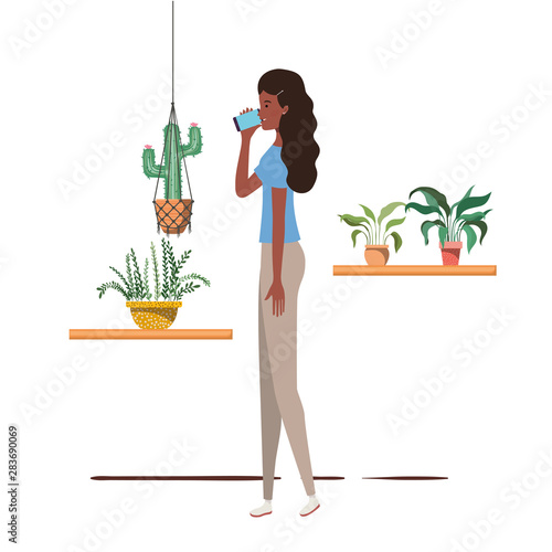 woman with houseplant and macrame hangers
