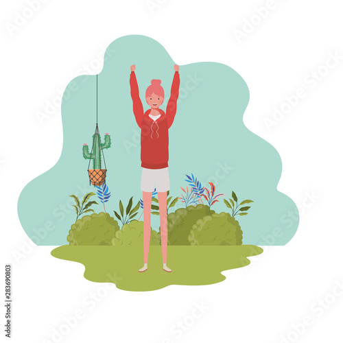 woman with macrame hangers and background landscape