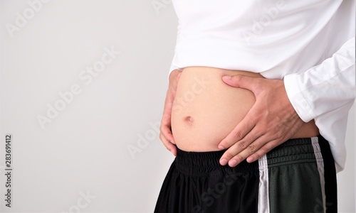 Obraz na płótnie お腹 男性 脂肪 ダイエット