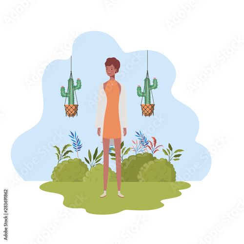 woman with macrame hangers and background landscape