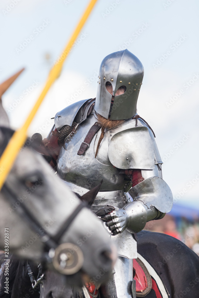 A man knight involved in a fight A man knight involved in a fight