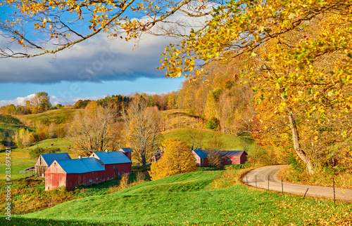 Jenne Farm with barn at sunny autumn morning in Vermont, USA photo