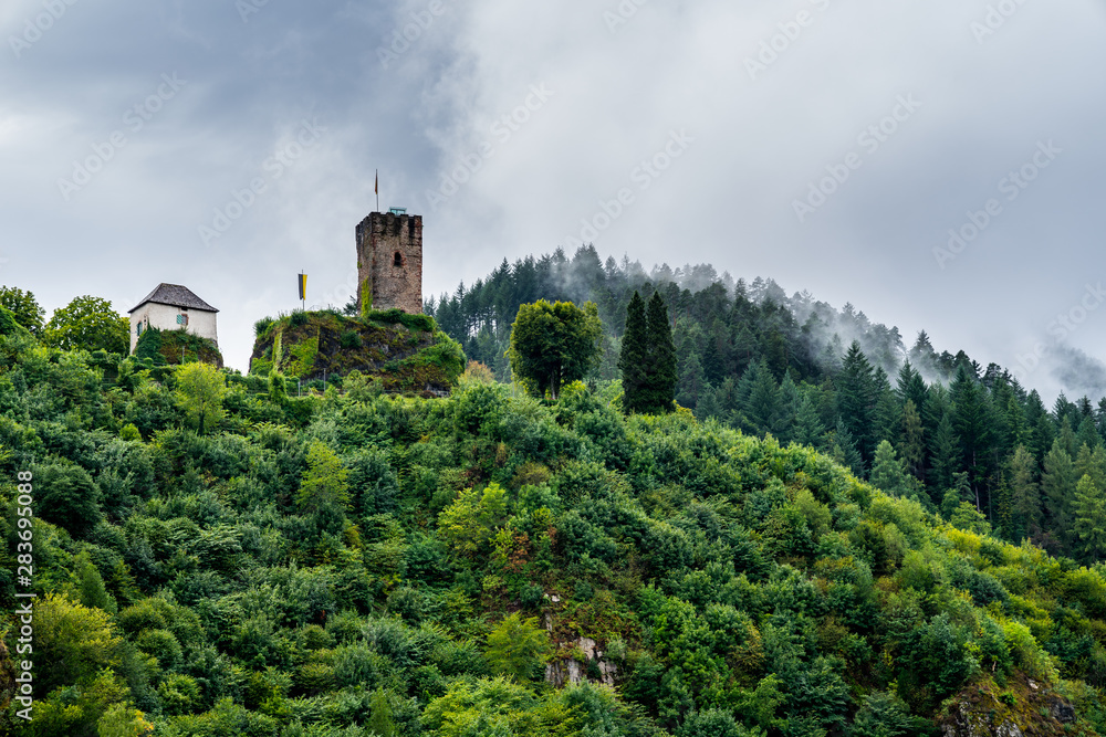 Germany, Historical world famous old castle tower ruins of little black forest village hornberg in ortenaukreis in foggy atmosphere, famous for story of hornberg shooting