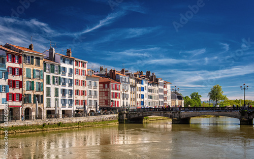 Colorful houses at the Nive river embankment in Bayonne, France