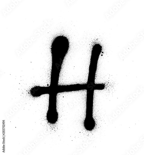 graffiti thin H font sprayed in black over white