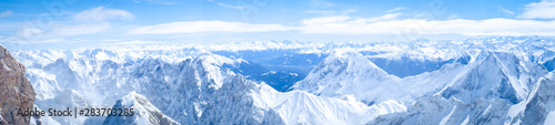 Beautiful view of Zugspitze mountain. The highest place in Bavaria, Garmisch-Partenkirchen, Germany. Snowy peaks of the Alpine Mountains.