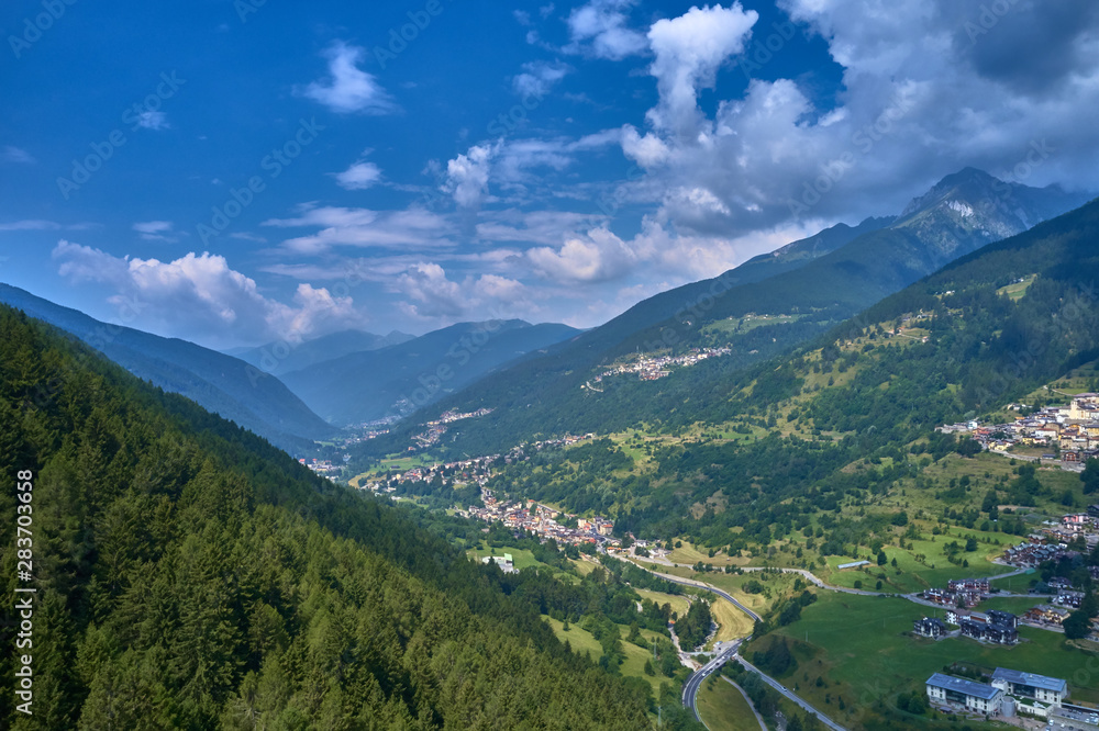 Panoramic view of the Ponte di Legno region of Trento the north of Italy. The popular ski resort town of Ponte di Legno. Summer time of the year. Aerial view. Photo taken on a drone.