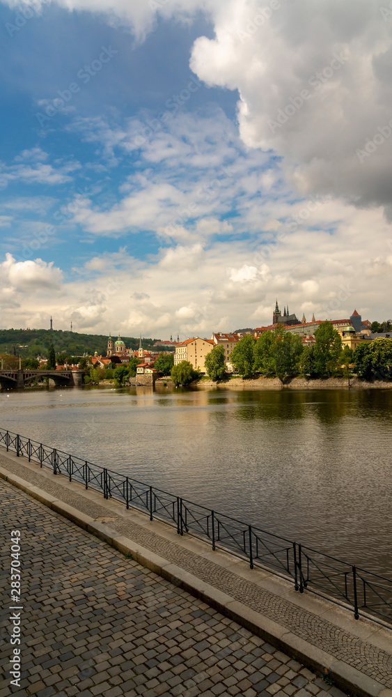 Vltava River runs through Prague on a summer day